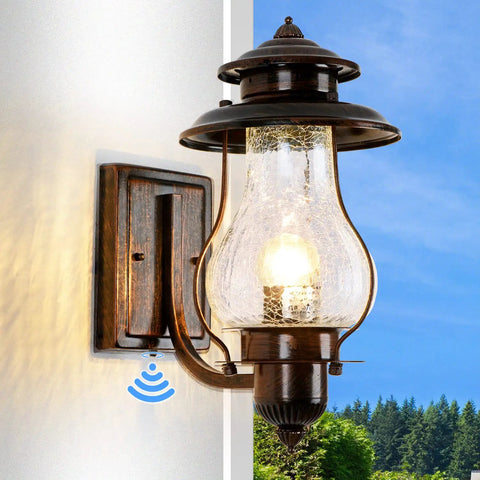 No Fuss Dusk To Dawn Sensor Outdoor Wall Sconce With Photocell, waterproof oil rubbed brown porch light on wall against blue sky.