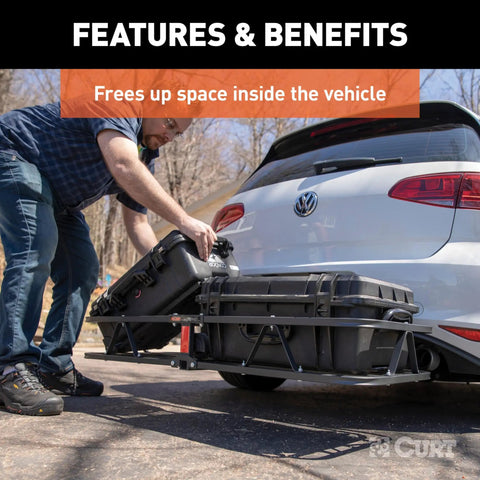 Person loading gear on Heavy Duty Cargo Basket Hitch Carrier For SUV And Truck, 500 Lb Capacity, 46.5 x 17.5 x 5.5 inch rack