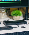 Next Gen Thunderbolt 3 Nvme Dock Packing 1Tb Ssd Storage Delivers Blazing Fast Transfer Rates Up To 1500 Mbps on a desk setup.