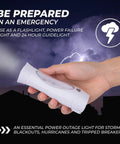 Hand holding LED flashlight against stormy sky, Six Pack LED Emergency Lights For Home Power Outage, Triple-Function Power Failure Light And Plug-In Flashlight Combo With Rechargeable Battery, Stay Ready For Snow Storms And Hurricanes.