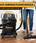 Professional Grade Wet Dry Upholstery Shampoo Vacuum Featuring Remote Control Handle And Six Gallon Tank For Autos Carpets And Furniture Bad Ass Dirt Hog Rig with multi-surface floor nozzle on hardwood floor.