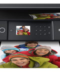 Slick Wireless Color All In One Inkjet Printer Featuring Killer Five Color Photo System For Crisp Documents And Legit Eight By Ten Prints, printing a colorful photo.