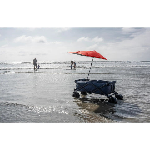 Versa Brella Firebrick Clamp On Shade Umbrella With UPF 50 Plus Protection attached to beach cart by the sea