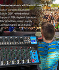 DJ using HT7 Bluetooth Portable DJ Mixer With USB MP3 Jack And 48V Power during outdoor set, crowd in background