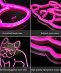 Close-up of pink LED neon dog sign for wall decor, highlighting silicone neon tube and acrylic backing showing French bulldog design.