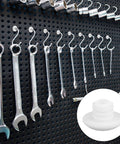 120 Pack White Pegboard Hook Stoppers Lock It Down And Keep Gear Secure Heavy Duty Silicone Safety Clips Halt Hook Drop Fits Standard Wall Mounts Garage Setup Routine on a tool pegboard displaying wrenches.