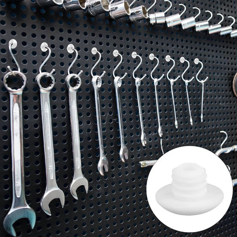 120 Pack White Pegboard Hook Stoppers Lock It Down And Keep Gear Secure Heavy Duty Silicone Safety Clips Halt Hook Drop Fits Standard Wall Mounts Garage Setup Routine on a tool pegboard displaying wrenches.