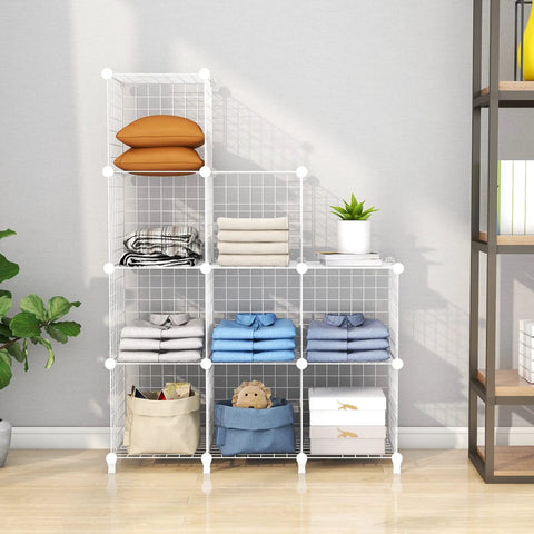 Pink 20 Cube Closet Organizer System with clothes and storage items, visible metal frame and ABS connectors, setup in a room.