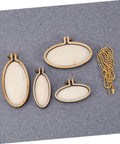 Five Piece Mini Wood Embroidery Hoops Set With Screws For Cross Stitch And DIY Needlework on grey background