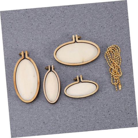 Five Piece Mini Wood Embroidery Hoops Set With Screws For Cross Stitch And DIY Needlework on grey background