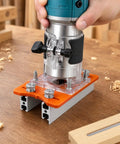 Rock Solid Wood Trimmer Router Base And 2 In 1 Compact Palm Router Base with orange plate and aluminum alloy, ideal for fine woodwork.