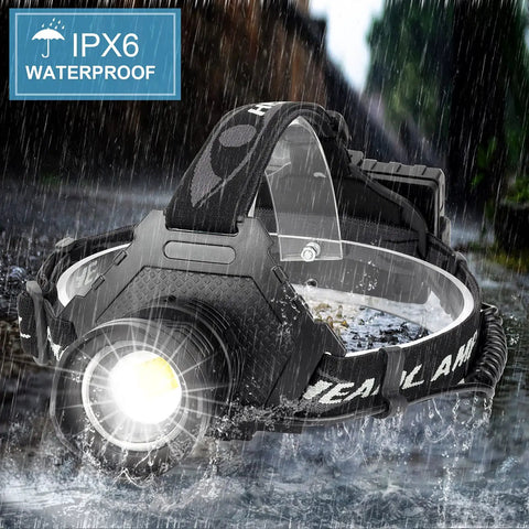 USB Rechargeable LED Headlamp With 90,000 Lumen XHP70 LED in rain, showcasing waterproof design and robust build, ideal for outdoor use.
