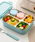 Bento lunch box with Eight Pack 2 Oz Salad Dressing Containers To Go With Lids for sauces, surrounded by various snacks and a fork