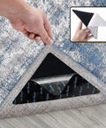 Person installing 4 Pack Non Slip Rug Pad Grippers With Double Sided Reusable Adhesive For Area Rugs And Corners Keeps Rugs From Sliding