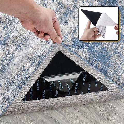 Person installing 4 Pack Non Slip Rug Pad Grippers With Double Sided Reusable Adhesive For Area Rugs And Corners Keeps Rugs From Sliding