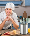 Chef smiling in kitchen with Extra Large 360 Degree Rotating Kitchen Utensil Holder Caddy With Three Compartments Stainless Steel Silverware Organizer for Countertop.