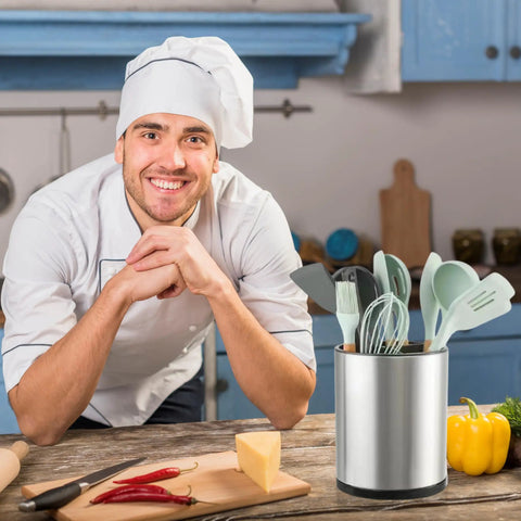 Chef smiling in kitchen with Extra Large 360 Degree Rotating Kitchen Utensil Holder Caddy With Three Compartments Stainless Steel Silverware Organizer for Countertop.