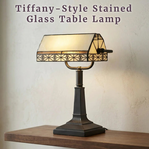 Tiffany Style Bankers Lamp With Stained Glass Shade For A Dope Desk Setup on wooden table, vintage mission design, warm glow