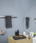 4 Piece Bathroom Hardware Set With Stainless Steel Towel Bar Towel Holder Robe Hook And Toilet Paper Holder Built To Last Dope Quality Rust Resistant SUS304 Bath Accessories For Everyday Use installed in a modern bathroom setting.
