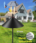 19 Inch Metal Squirrel Baffle For Bird Feeder Poles And Shepherds Hook installed on a pole with a bird feeder, outdoor setting.