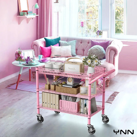 Built Tough Pink Rolling Cart Three Tier Heavy Duty Metal Utility Shelf With Smooth Rollin Wheels and Easy Grip Handle in stylish living room.