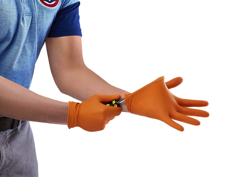 Person wearing Hi Visibility Orange Nitrile Gloves 8 Mil Thick Large Heavy Duty One Size Fits Most with tool in hand