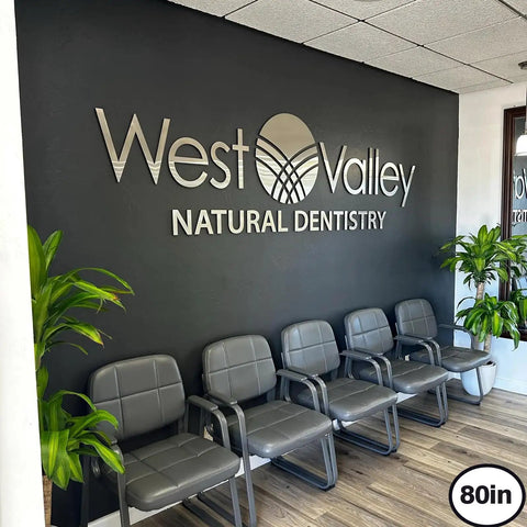 Bold Custom Acrylic Sign With Large 3D Laser Cut Logo for Salon Spa Office Storefront Wall Decor in dental office reception.