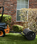 Tow Behind And Manual Lawn Roller 30 Gallon Water Filled Steel Sod Roller with push pull handle in use on lawn