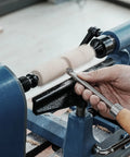 Person using woodturning lathe with Pen Mandrel Bundle For Woodturning Lathe With Mandrel Saver, 2MT Taper for pen making.