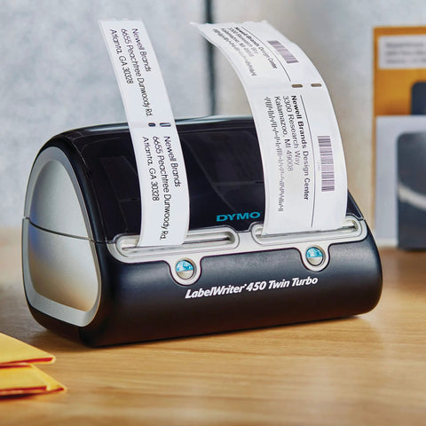 Straight Up Twin Turbo Direct Thermal Label Printer With Dual Roll Setup for Fast Shipping Labels printing labels on a desk.