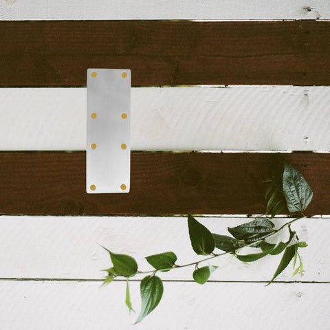 Flat Corner Brackets For Furniture Joints And Cabinet Support, Stainless Steel 4 Pcs on wooden background with leaves