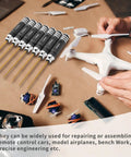 Heavy Duty Pro Grade Titanium Coated Hex Screwdriver Kit With Seven Precision Steel Bits For Fpv Racing Drones Rc Helicopters And Watercraft Hassle Free Tuning Gear on a workspace with drone parts.
