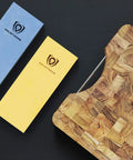 Premium Whetstone Kit With 3000 And 8000 Grit, Extra Large Stones, Top Notch Corundum on cutting board, knife visible