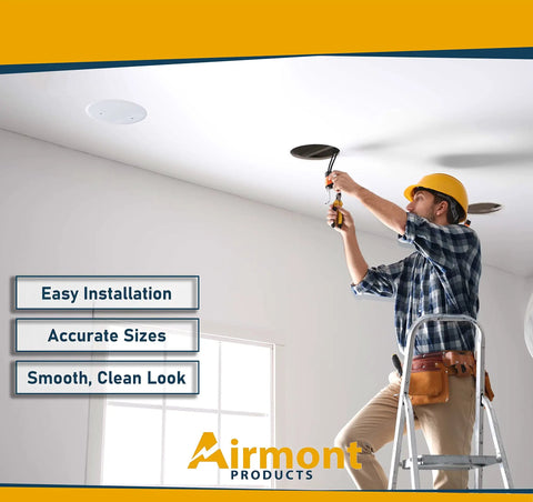 Set Of Two Five Inch White Metal Ceiling Blank Up Cover Plate For Three And One Half Inch Round Or Octagon Electrical Boxes With Two Point Seven Five Inch Hole Spacing And Mounting Screws Included For Ceiling Or Wall Coverage being installed by a man on a ladder
