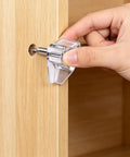 Inserting 50 Pack 5mm Clear Plastic Shelf Pegs With Steel Core For Cabinets, Kitchen, Bookcases, And Closets Replacement Shelf Holders