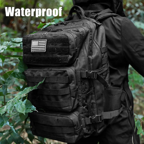 Person wearing 50L Military Tactical Backpack For Men With Molle System Large Daypack 3 Day Assault Pack Bug Out Bag in forest