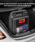 DNA Motoring 6-ton hydraulic bottle jack in blue stored in a black carrying case in the car trunk