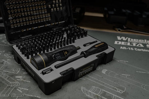 100 Piece Pro Fat Wrench Screwdriver Set With Durable Construction And Storage Case For Gunsmithing And Maintenance, Includes Metric And Standard Bits, Rubber Overmolded Handles, Non Slip Grip, Ergonomic Fixed Driver, Ready For Tightening. Open case on work mat.