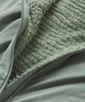 Close-up of the fuzzy midlayer of Evolute Hoody Lightweight Insulated Jacket For Hiking And Climbing With PrimaLoft Evolve Active Warmth