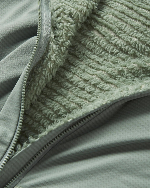 Close-up of the fuzzy midlayer of Evolute Hoody Lightweight Insulated Jacket For Hiking And Climbing With PrimaLoft Evolve Active Warmth
