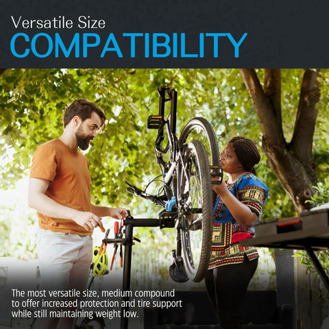 Two people working on a bike, illustrating compatibility of Diamana HD Front And XHD Rear 27-Inch Tubeless Foam Tire Insert Set