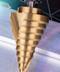 Titanium Nitride Coated HSS Step Drill Bit With One Quarter Inch Hex Shank Ten Imperial Step Sizes From One Quarter Inch To One And Three Eighths Inch Spiral Groove Double Flute 135 Degree Split Point For Sheet Metal Aluminum PVC Copper Acrylic NordWolf
