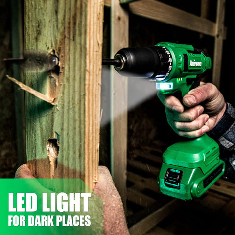 Person using 20V Cordless Drill Set with Battery and Charger, 350 In-Lb Torque to drill into wood with LED light on.