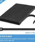 Image of 100 pack Eight Inch Reusable Cable Ties with Hook and Loop Wraps, black, for cord management and organization.