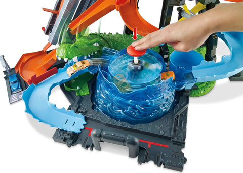 City Car Wash Play Set With Giant Gator Color Change Fun Elevator Lift And Rolling Brush Track For Kids To Wash Cars And Build Imaginative Adventures Today featuring a hand operating the splash track.