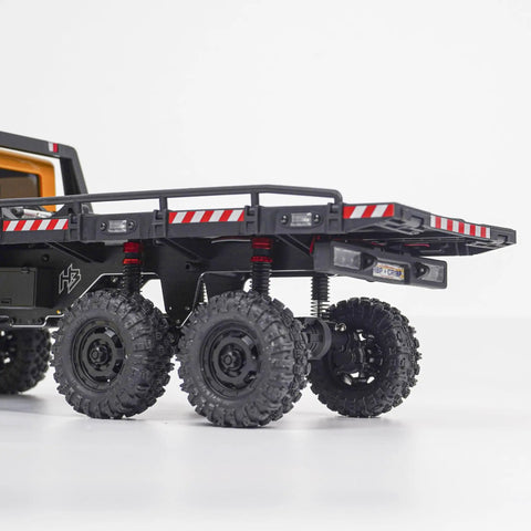 Rear view of Six Wheel 6x6 RC Rock Crawler V1.5 1/18 Scale All Terrain Off Road Ready To Run with 2 Speed Transmission, black tires