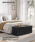 Mazie Collection 43 Inch Folding Storage Ottoman Bench With Hidden Storage Foot Rest Stool in a bedroom setting.