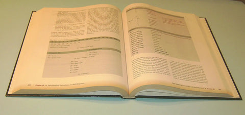 Open book showing pages from 'Hands On PLC Mastery A Practical Pro Guide To Programmable Logic Controllers For Industrial Automation Program Analysis And Development Techniques Second Edition'