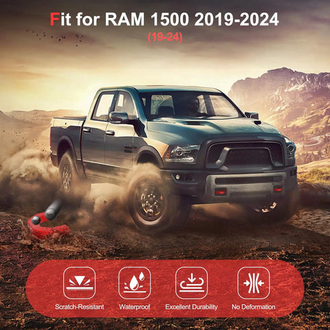 Dodge Ram 1500 with red tow hook covers driving on rugged terrain, showcasing waterproof and scratch-resistant features.