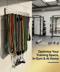 Upgraded Nine Hook Wall Mount Gym Storage Rack holding resistance bands in home gym